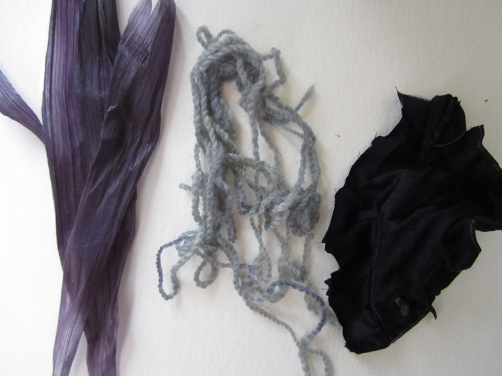 From right to left: cornhusks, wool, and silk cold dyed with black bean water