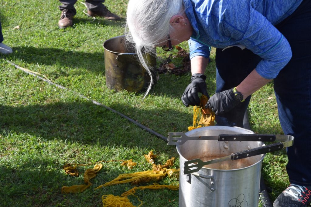 taking out the marigold dyed yarn